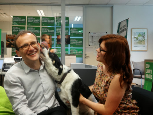 Adam Bandt, MP for Melbourne, listening closely to his constituents